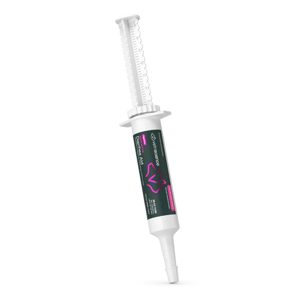  dental material syringe with black and pink label on a white background