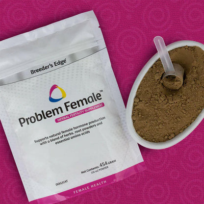 Breeders Edge Problem Female supplement package with a bowl of brown powder on a pink background
