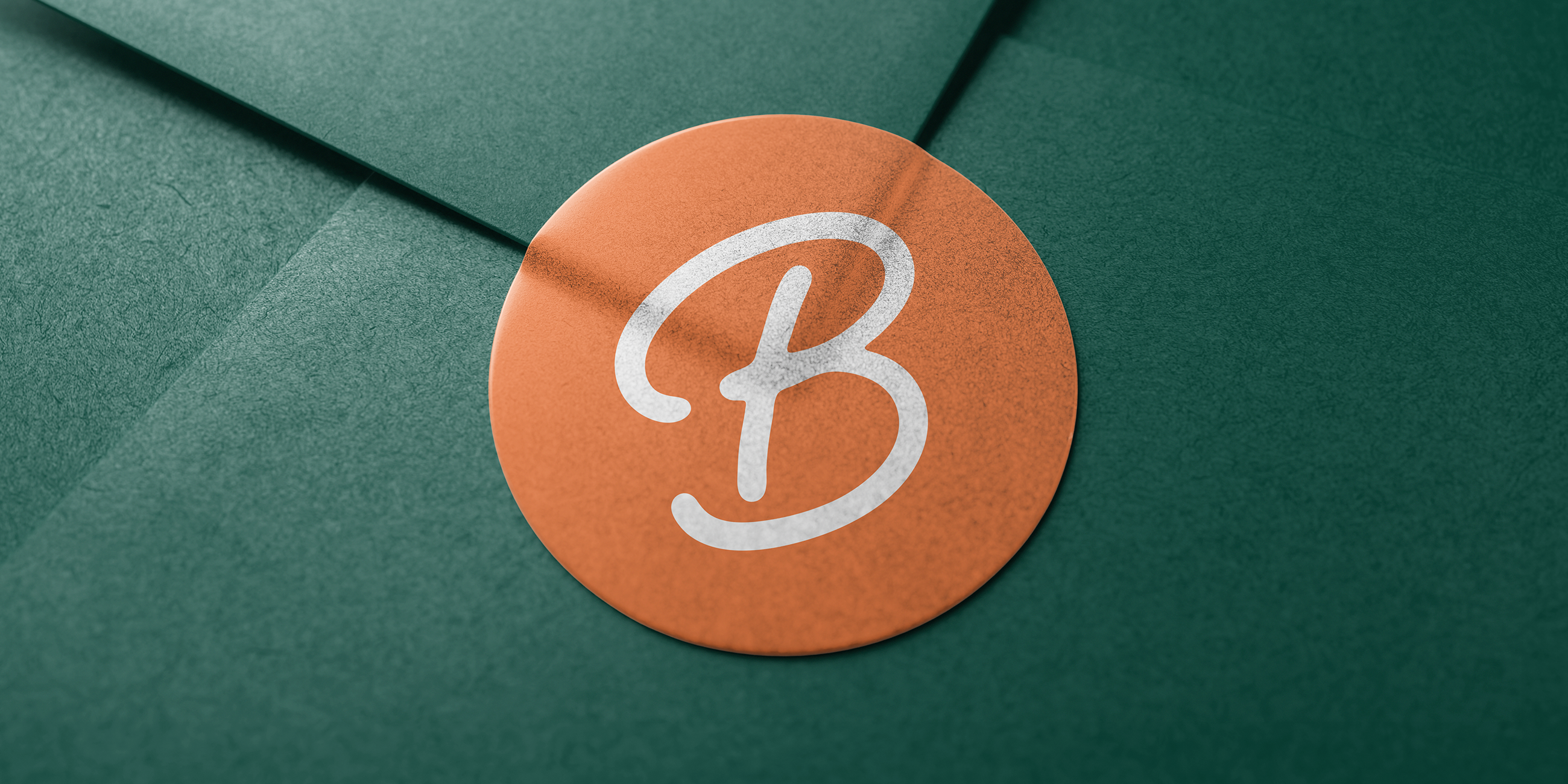 Boss Pets orange sticker on a green envelope