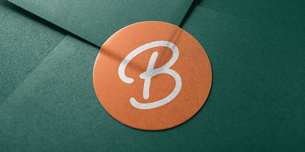 Boss Pets orange sticker on green envelope