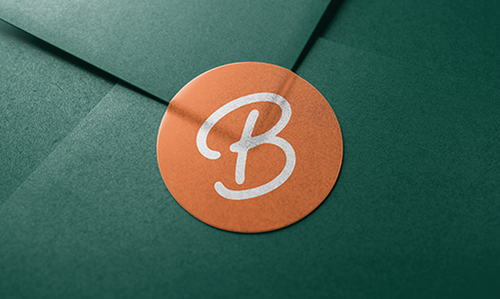Boss Pets orange sticker on green envelope