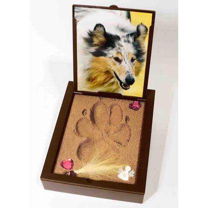 Pet memorial urn with paw print and photo of a dog on a white background