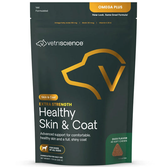 Vetriscience Healthy Skin & Coat supplement pouch for dogs, featuring a dark green background with gold and white text and graphics, including a dog head outline and a duck flavor icon. Omega Plus
