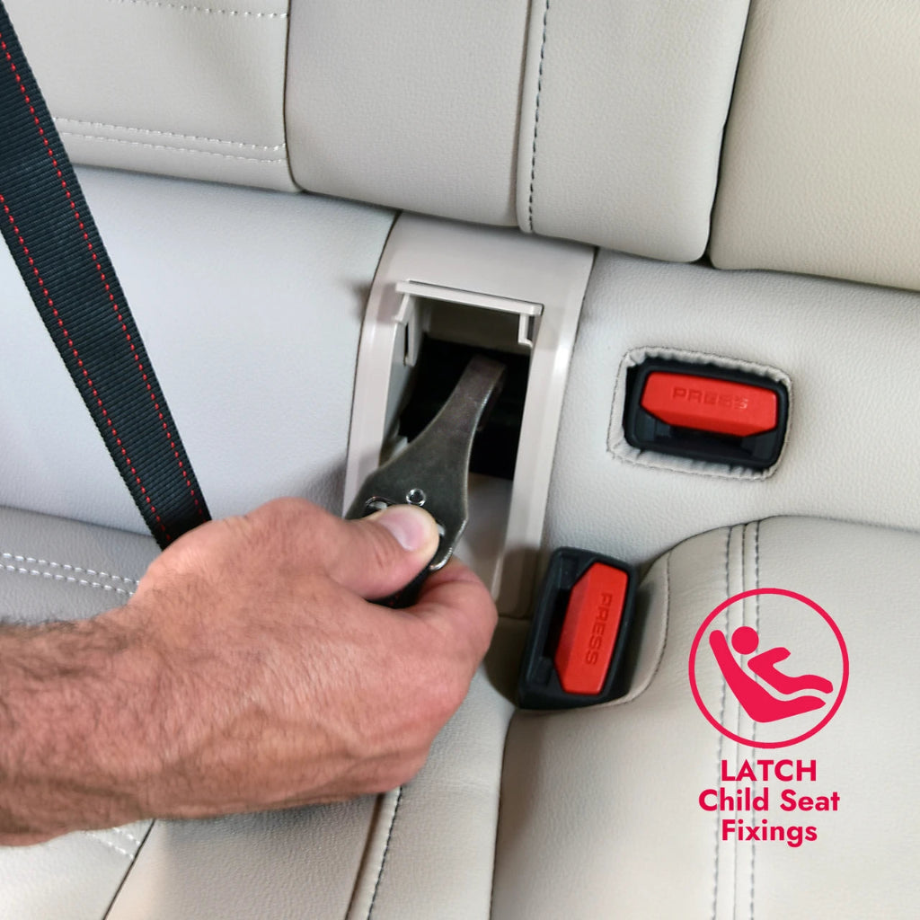 Person using a LATCH child seat fixing device on a car seat.