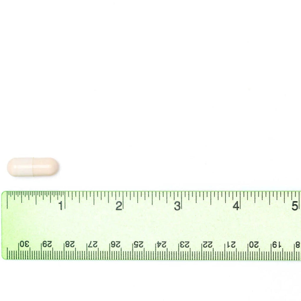 Omega Healthy Heart capsule shown beside a ruler to indicate its size