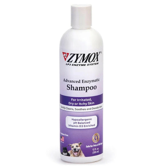 A white bottle of Zymox Advanced Enzymatic Shampoo for pets, featuring a purple label with white text and a small dog photo near the bottom, set against a plain white background.